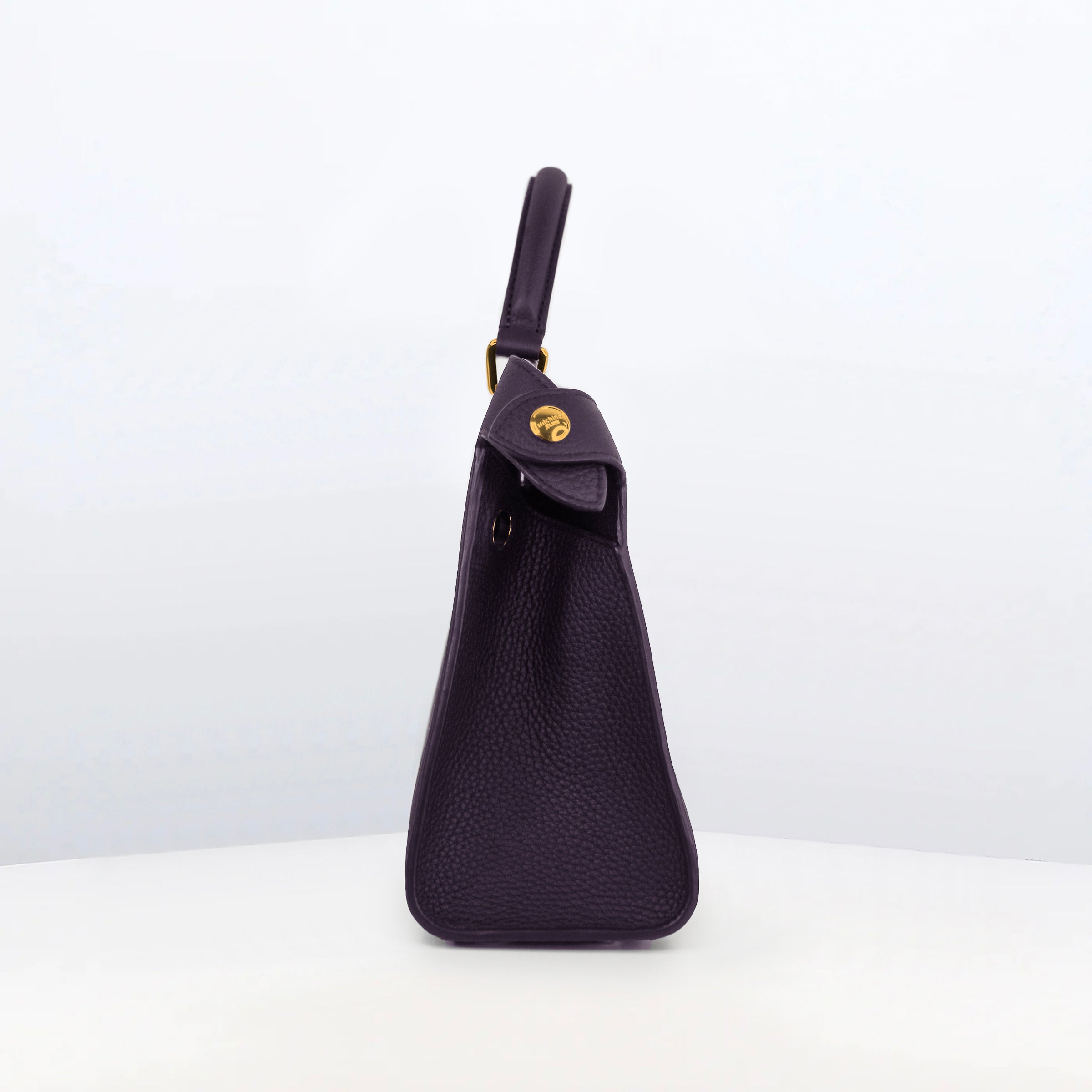 LEATHER HANDBAG LUTECE 27 RAISIN WITH GOLD HARDWARE