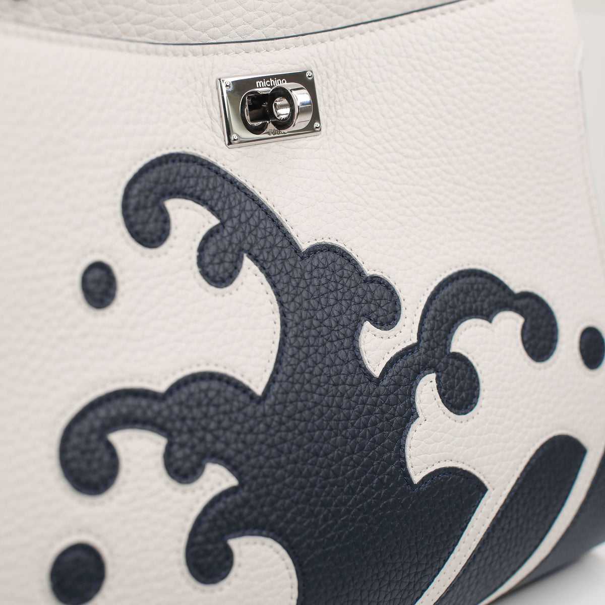 LEATHER HANDBAG LUTECE MINI WAVE