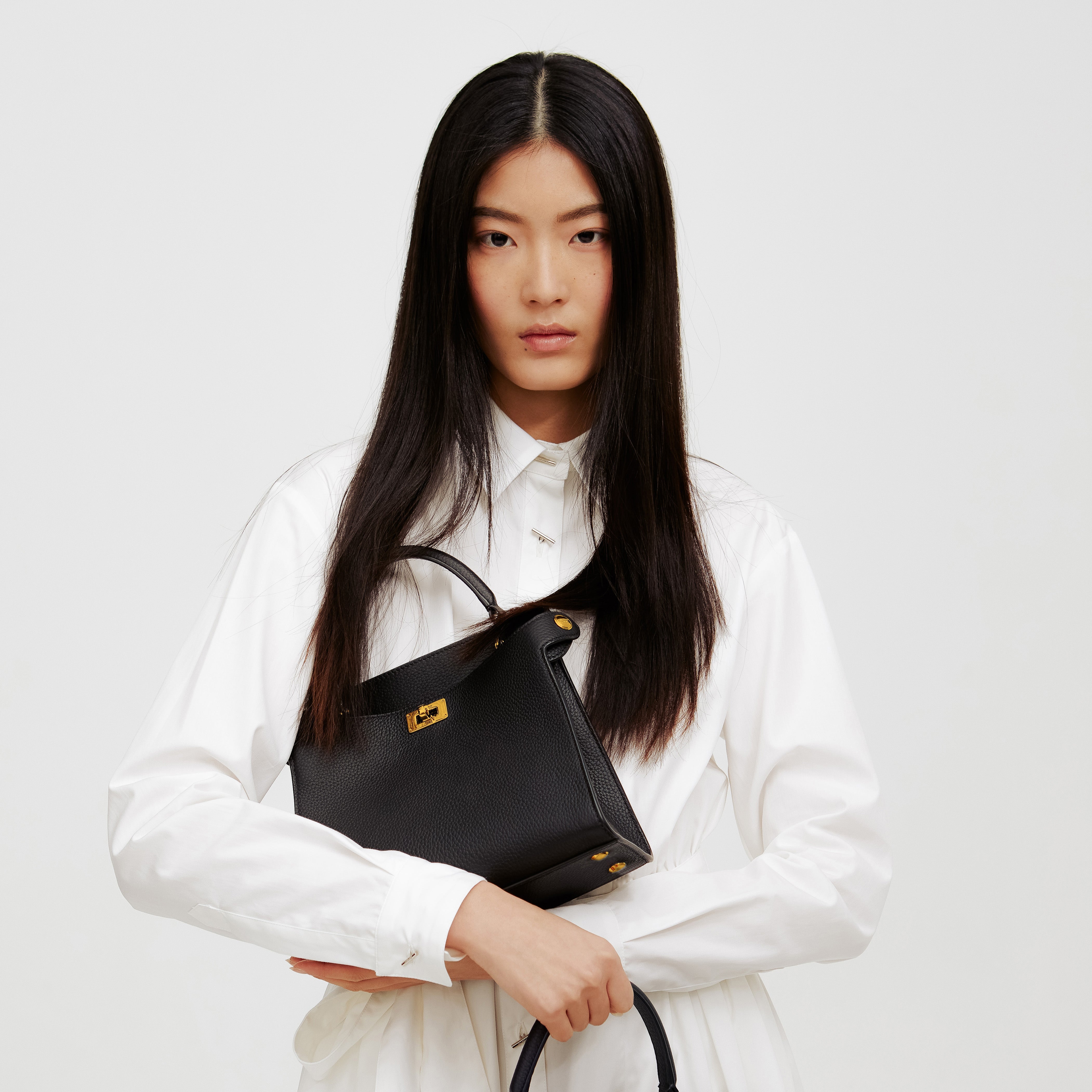 LEATHER HANDBAG LUTECE MINI BLACK GOLD HARDWARE