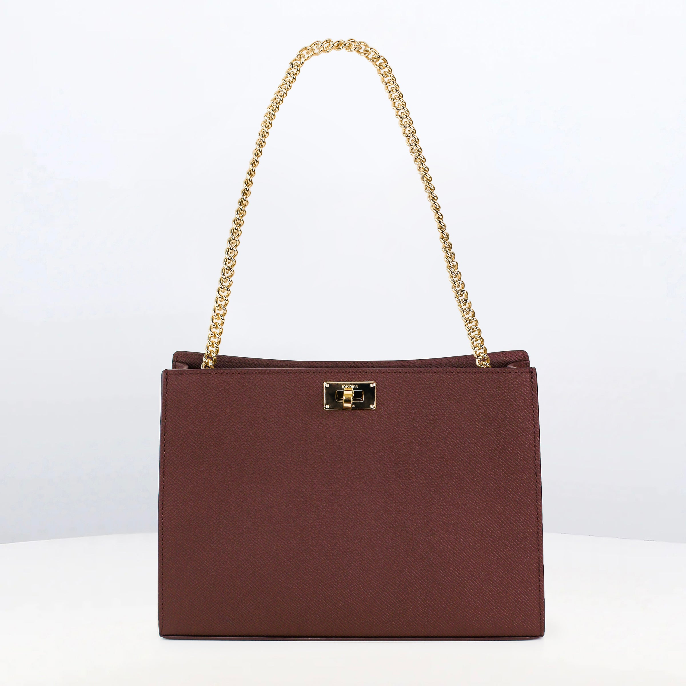 POCHETTE MONTAIGNE IN LEATHER PRUNE
