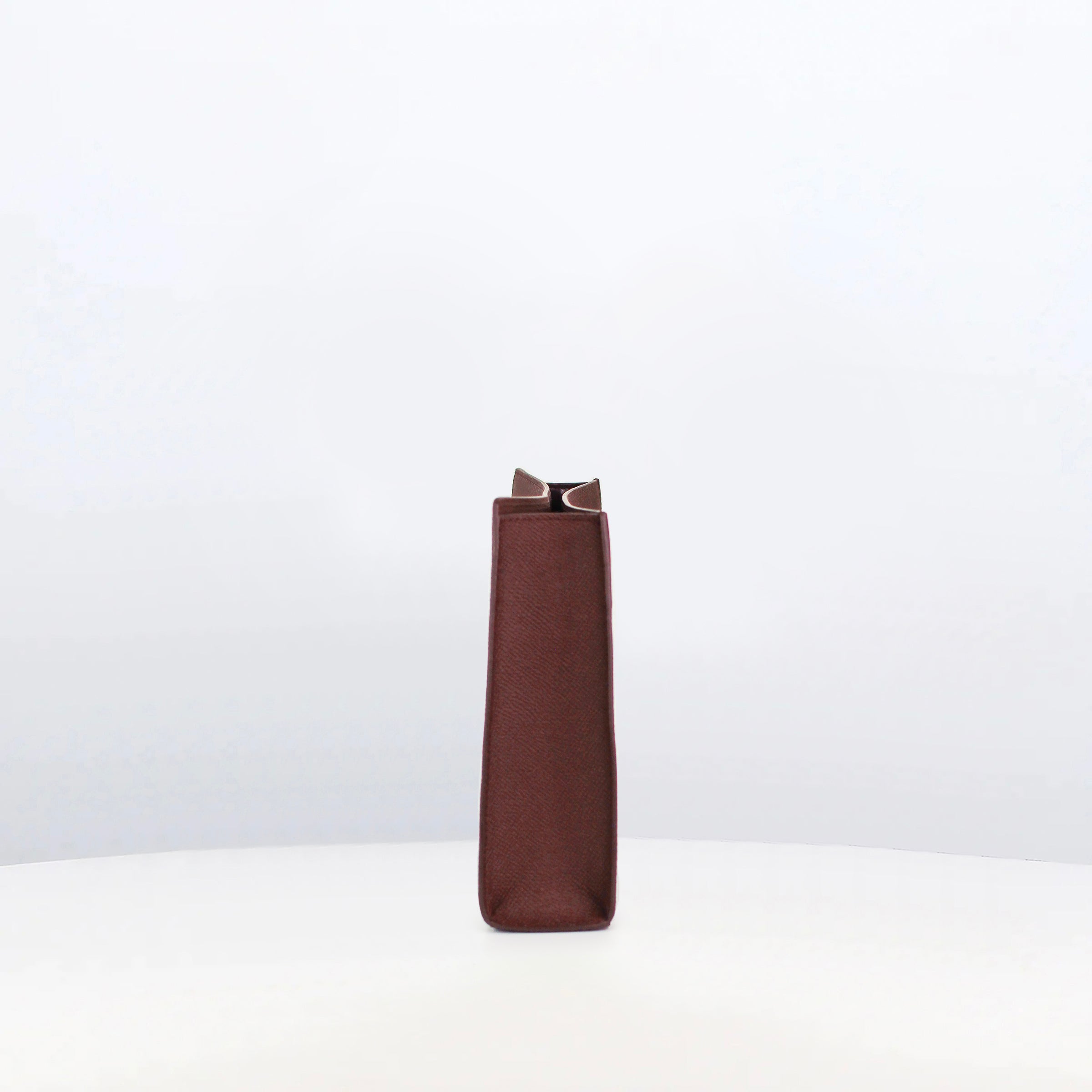 LEATHER POCHETTE MONTAIGNE PRUNE