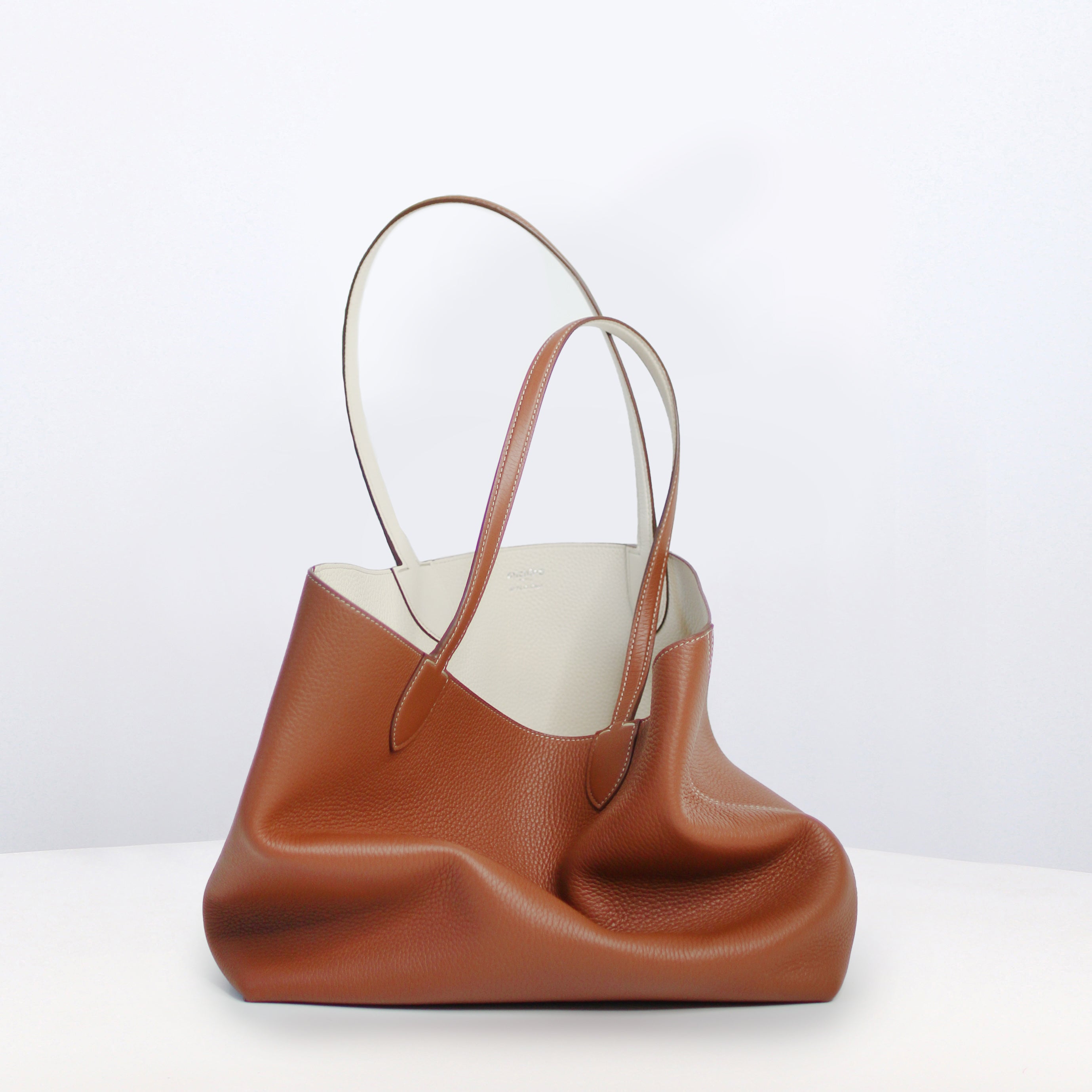 RIVOLI REVERSIBLE LEATHER TOTE BAG EAST/WEST GOLD/IVORY