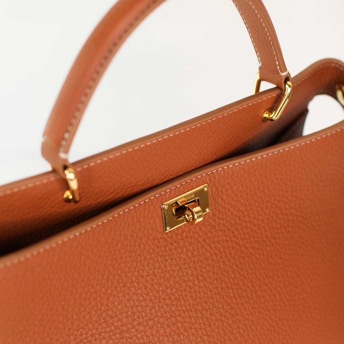 LEATHER HANDBAG LUTECE 27 GOLD WITH GOLD HARDWARE