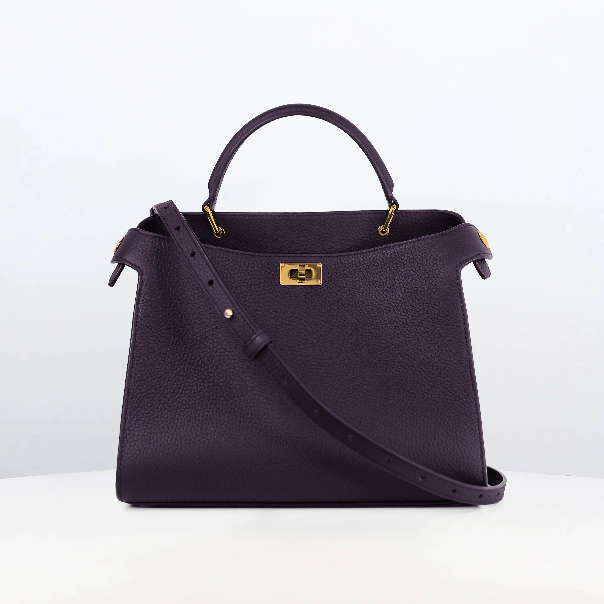 LEATHER HANDBAG LUTECE 27 RAISIN WITH GOLD HARDWARE