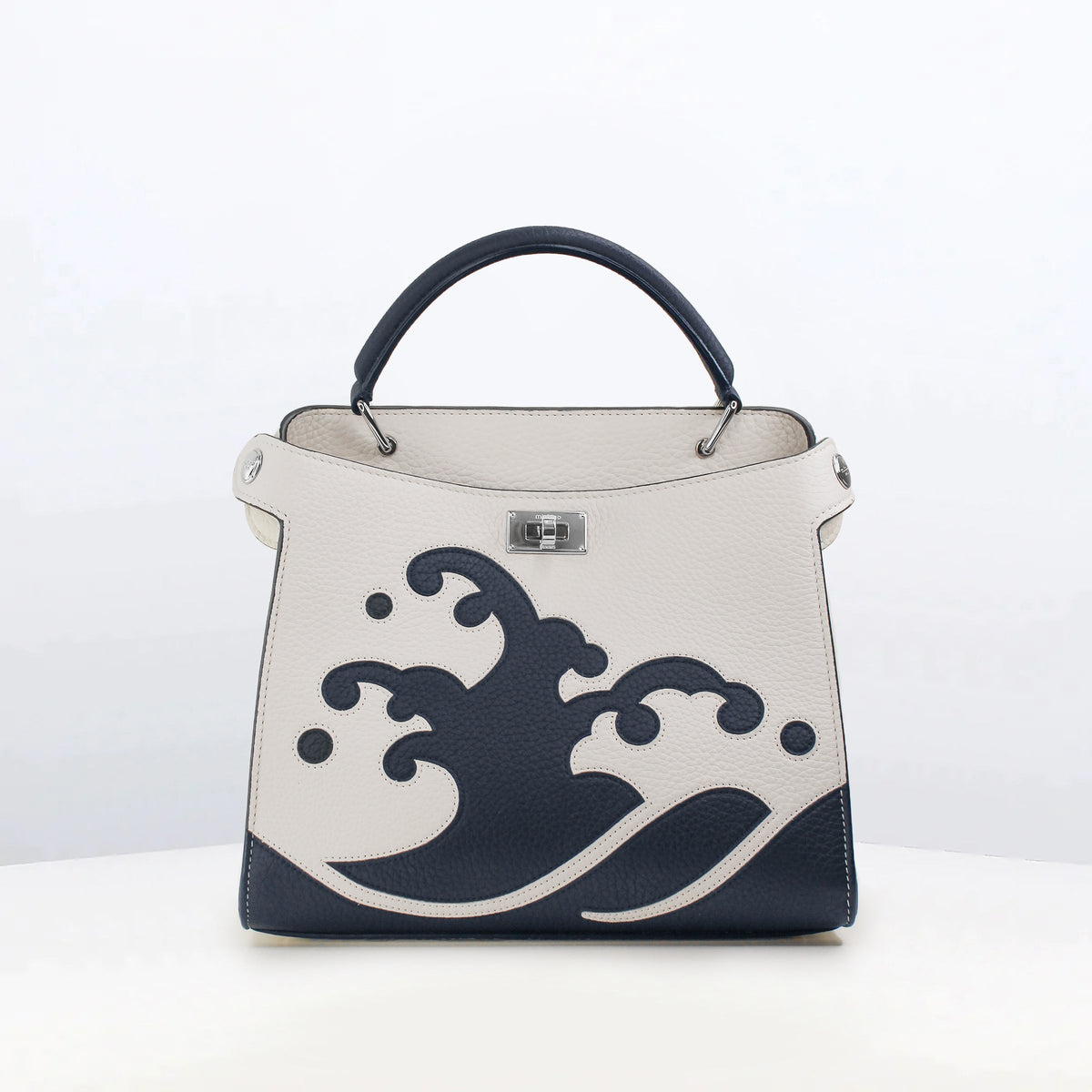 LEATHER HANDBAG LUTECE MINI WAVE