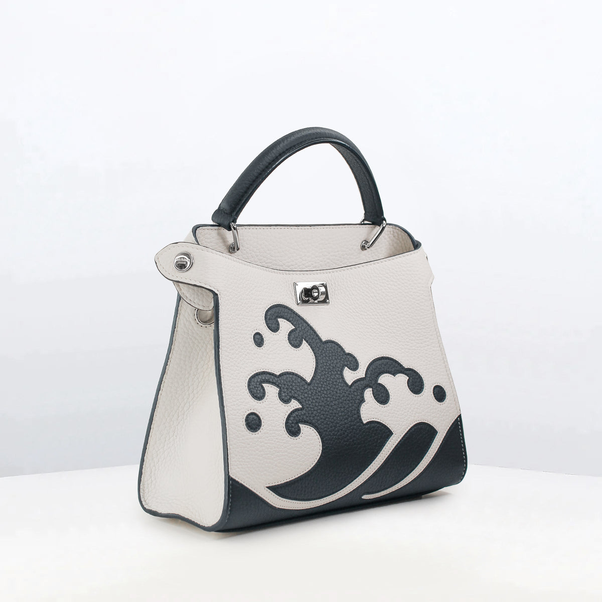 LEATHER HANDBAG LUTECE MINI WAVE