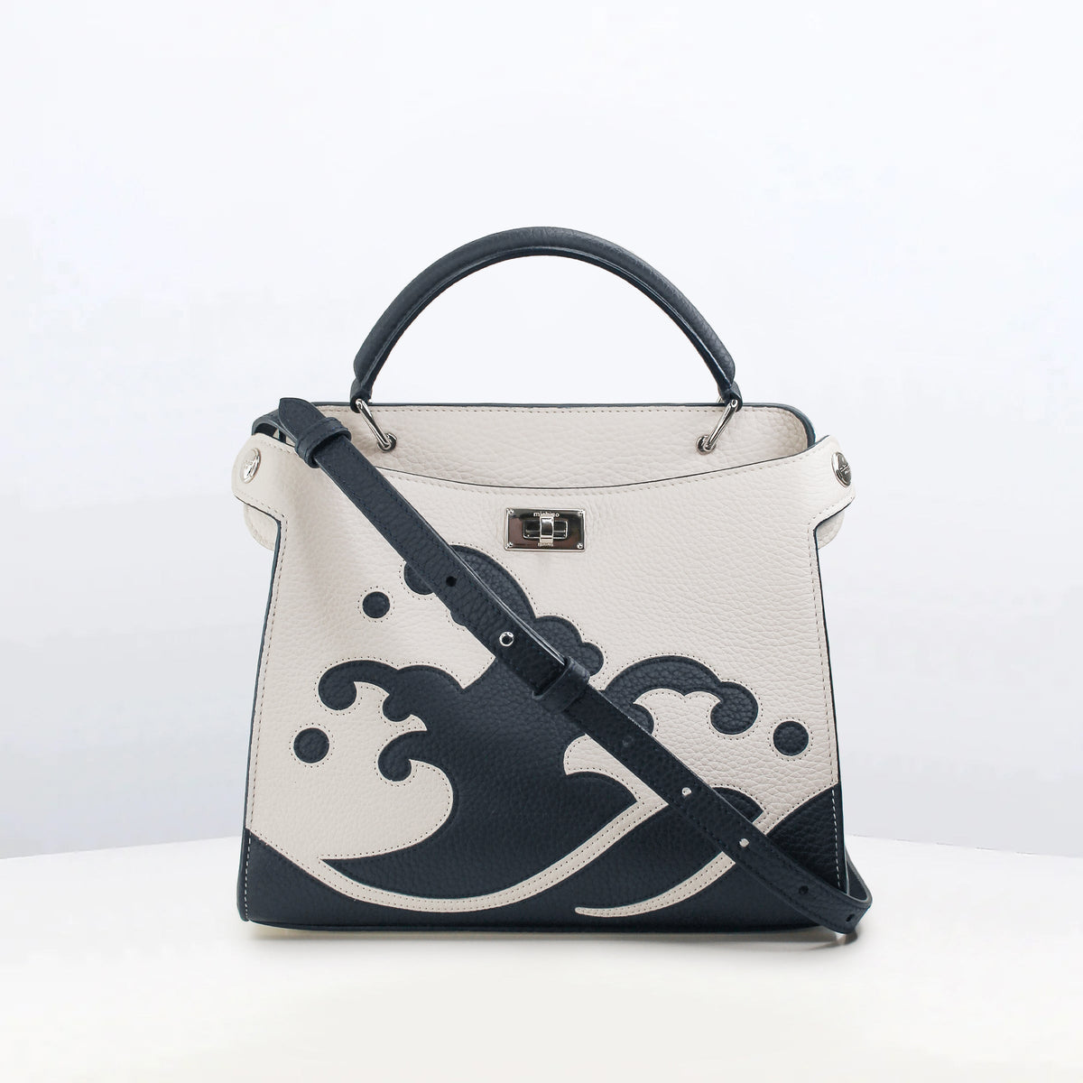 LEATHER HANDBAG LUTECE MINI WAVE