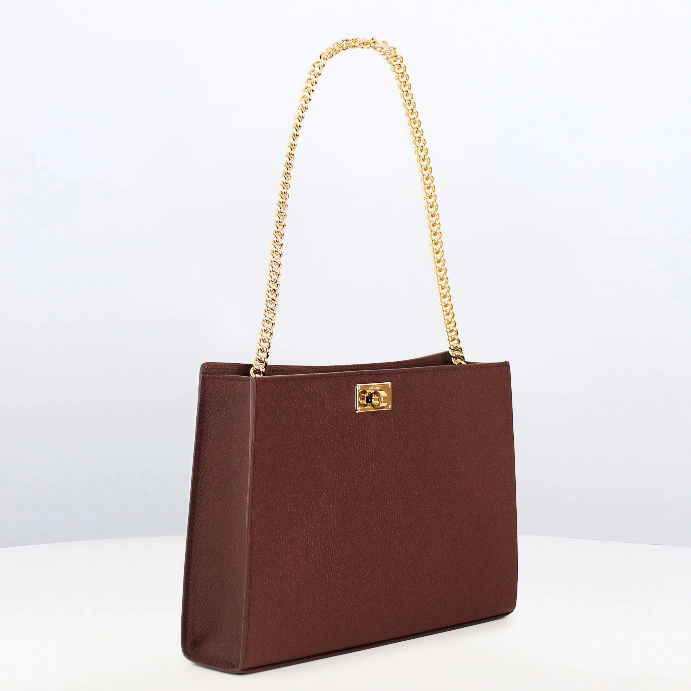 LEATHER POCHETTE MONTAIGNE PRUNE