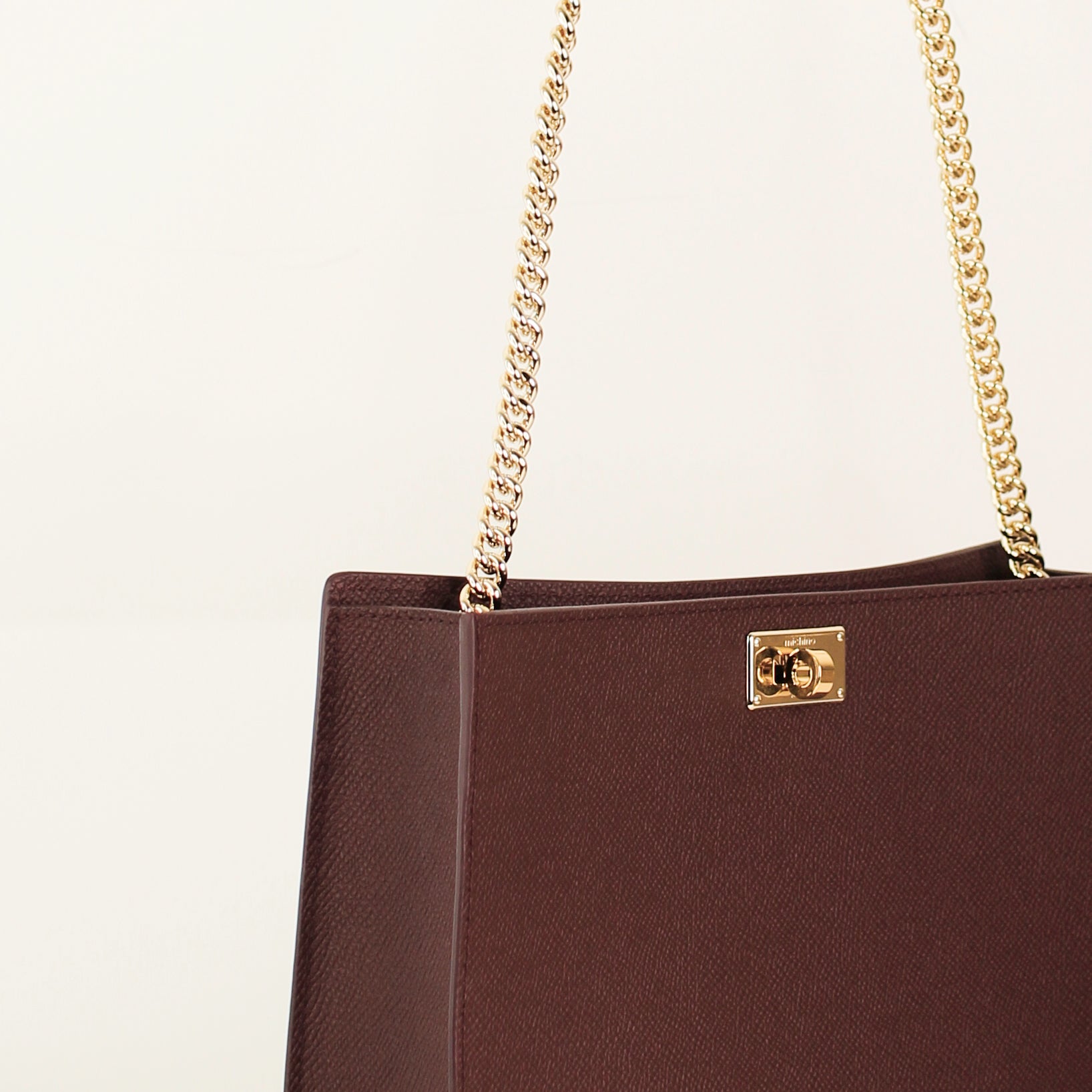 LEATHER POCHETTE MONTAIGNE PRUNE