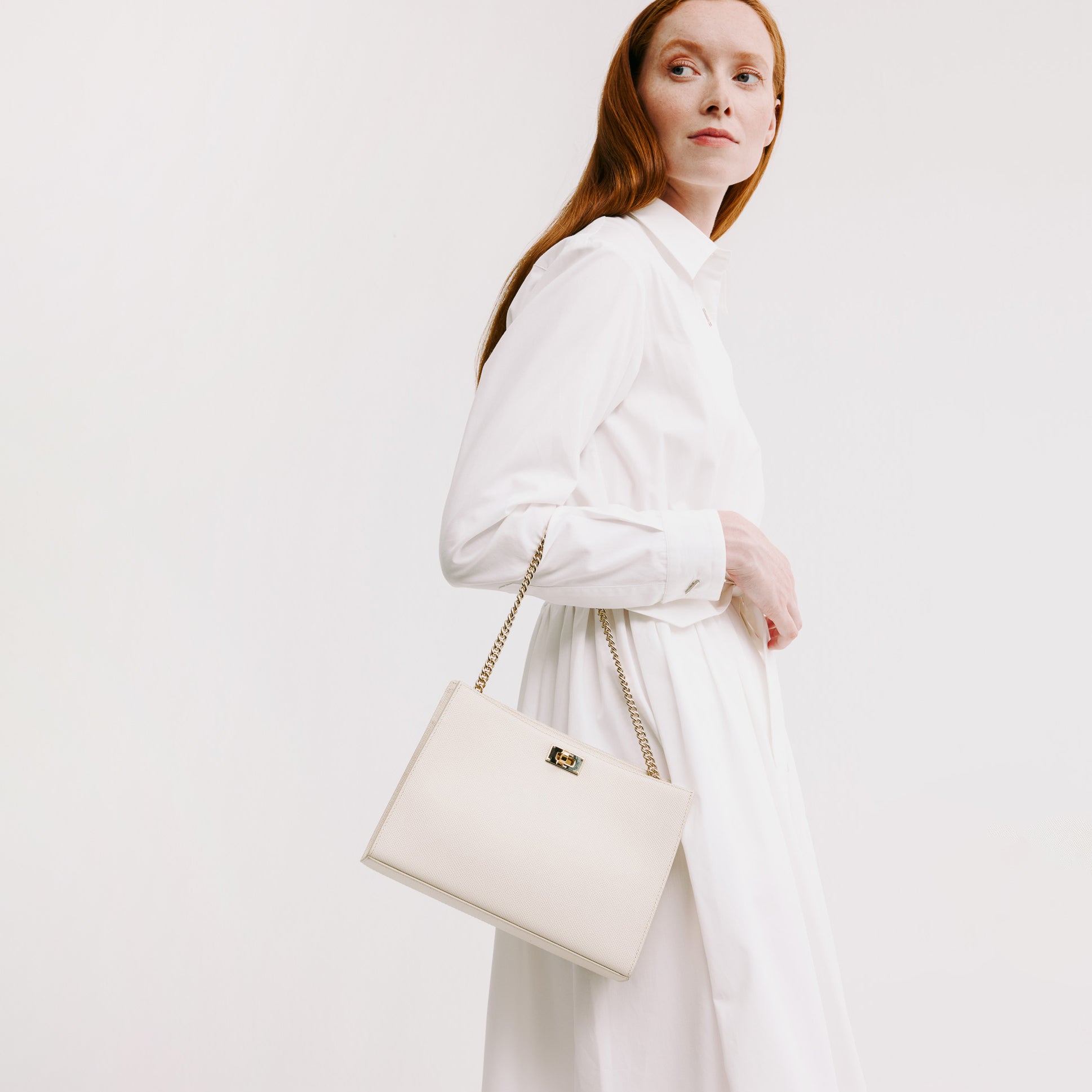 POCHETTE MONTAIGNE IN LEATHER IVORY