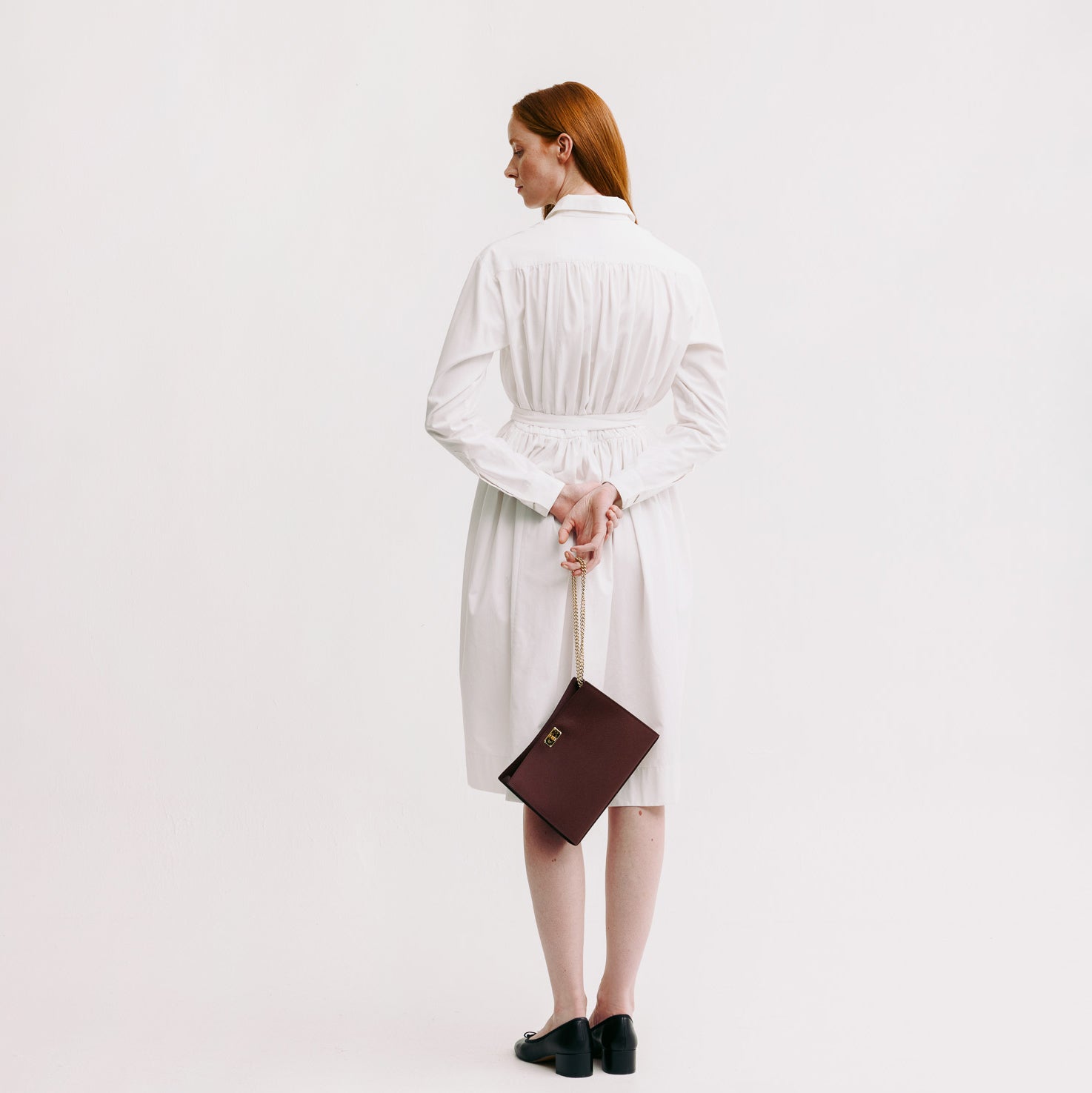 POCHETTE MONTAIGNE IN LEATHER PRUNE
