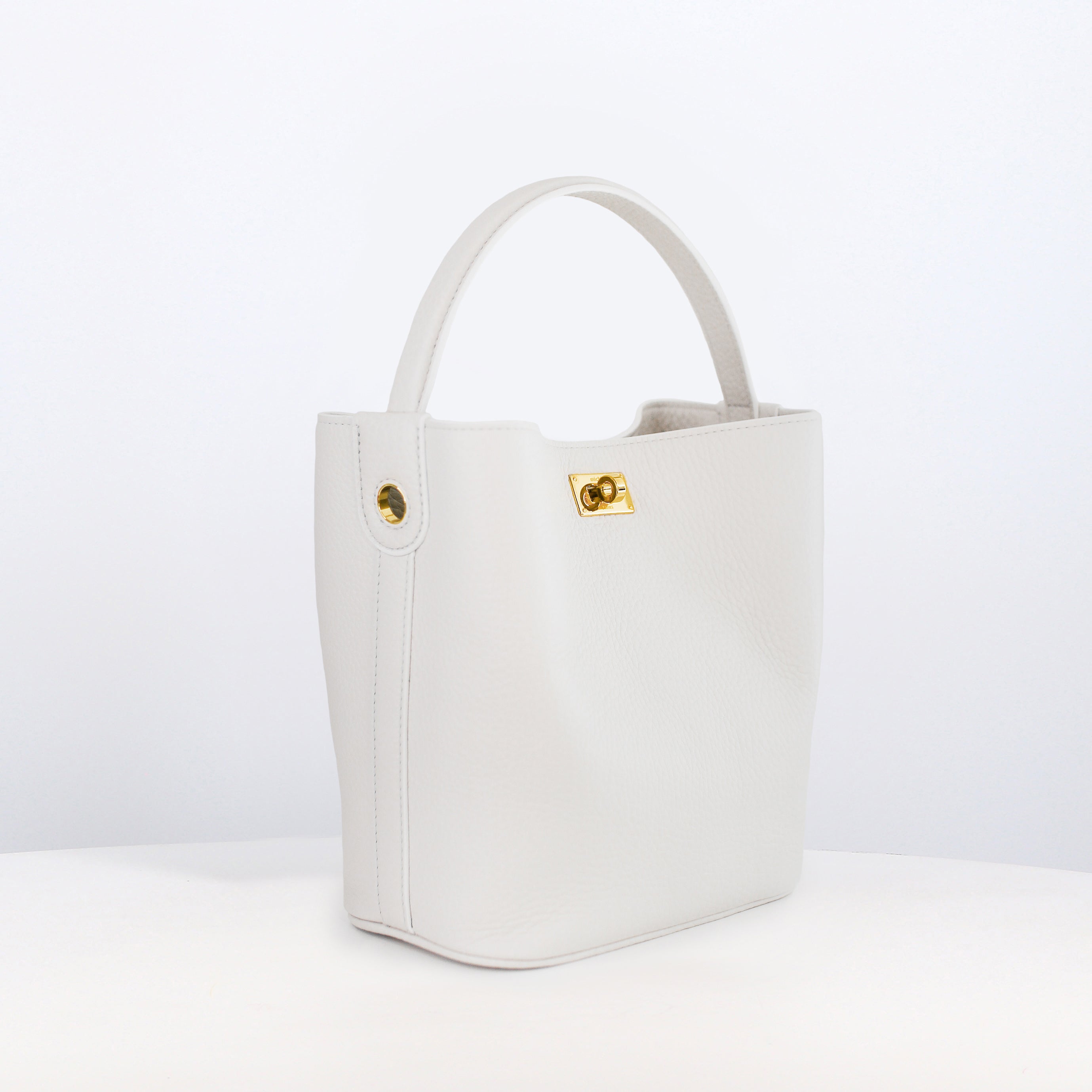 LEATHER BUCKET BAG ODEON MINI CRAIE WITH GOLD HARDWARE